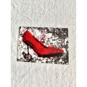 Jimmy Choo advertisement postcard with red, ruby slipper high heel ￼